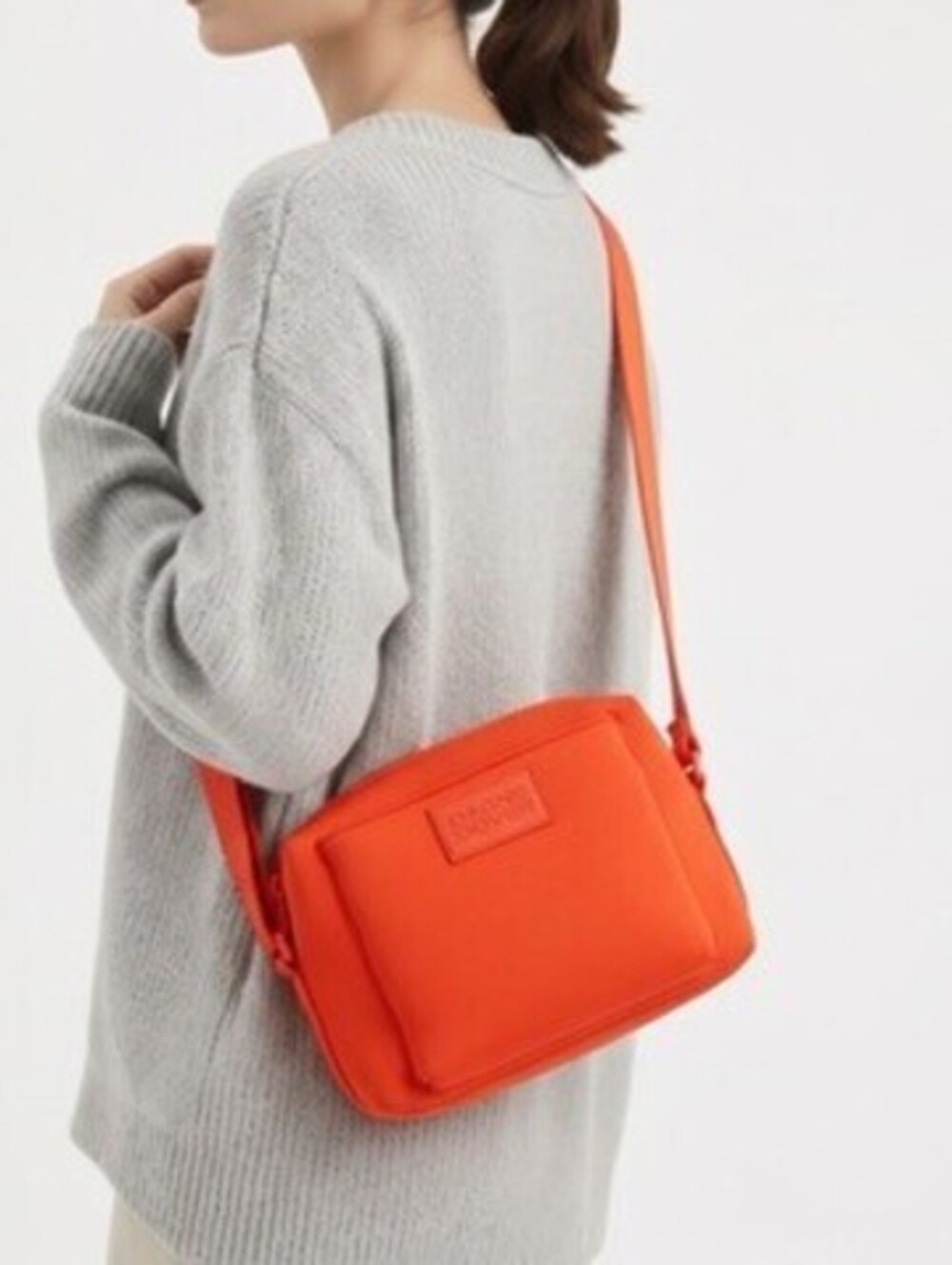 Dagne Dover Orange Micah Neoprene Crossbody Bag